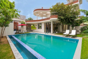 StayVista's The Tree House - City-Center Villa with Outdoor Pool, Spacious Balconies & Vast Lawn